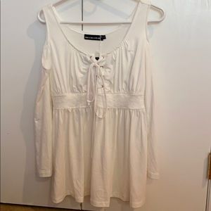 White shoulder cut out top